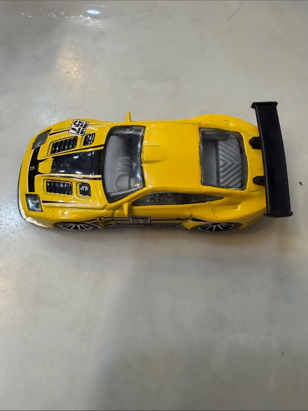 Ferrari Yellow and Black GT Racing Toy Car with Rear Wing